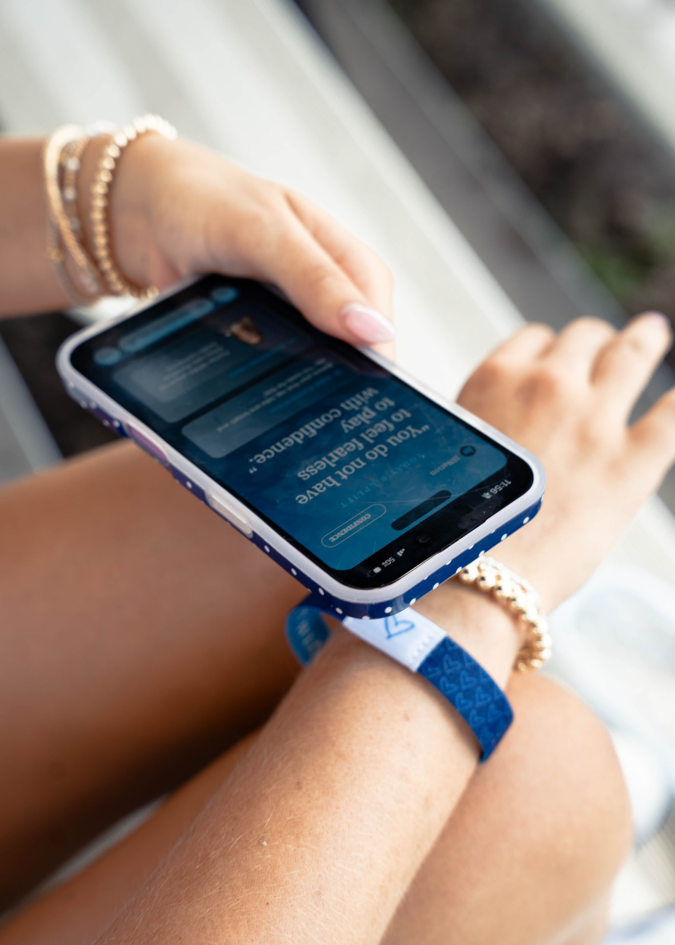 Athlete tapping their phone against an ISNation bracelet on their wrist